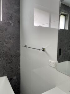 Modern toilet installed in a renovated bathroom