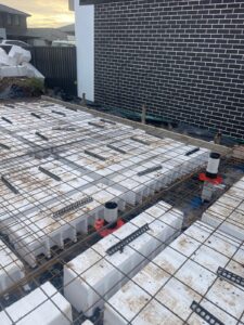 Roofing service in Australia with professional team repairing a roof